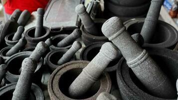 Traditional kitchenware named stone mortar and pestle photo