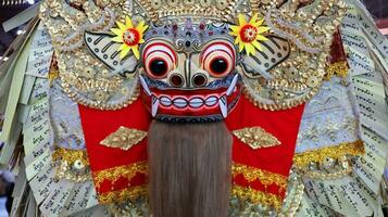 Frontal view of Barong, lion-like creature character in the mythology of Bali photo