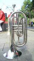 Close up on a valve section of a professional trumpet photo