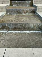 cascading fountain. architectural element in the form of steps for landscape design photo