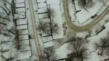 Bird's eye view on yards and roofs of living compounds video