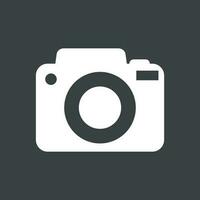 Camera icon on black background. Flat vector illustration.