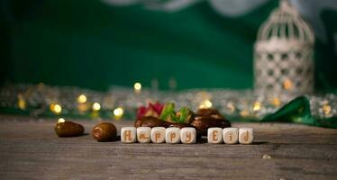 Congratulation HAPPY EID composed of wooden dices. photo