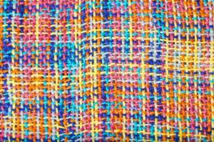 Colorful knitted surface. Closeup photo
