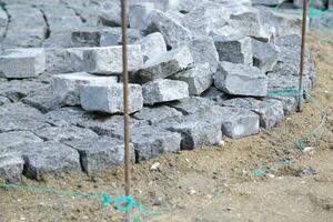 Laying of crushed rock road photo