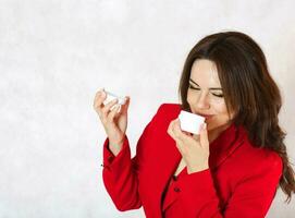 A young woman and a body cream photo