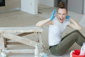 Young lady renovates  apartment photo