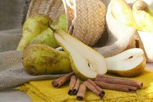 Green pears on a sackcloth photo