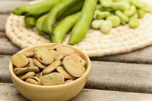 Dried beans in the clay dish photo