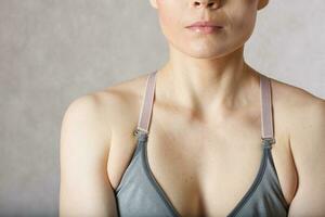 Underarm fat at young woman. Closeup photo