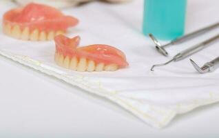 False teeth on a dentist's table photo