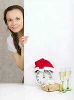 Young lady in Santa Claus hat photo