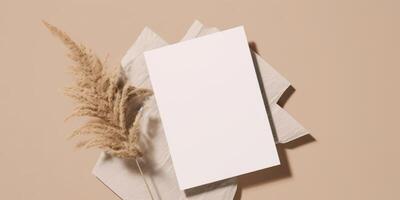 Mockup Paper Wedding Invitation Boho Minimal Style Greeting Card for Wedding Invitations and Birthday Stationery. Top View Flat Lay Copyspace. photo