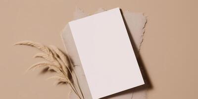 Mockup Paper Wedding Invitation Boho Minimal Style Greeting Card for Wedding Invitations and Birthday Stationery. Top View Flat Lay Copyspace. photo
