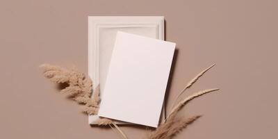 Mockup Paper Wedding Invitation Boho Minimal Style Greeting Card for Wedding Invitations and Birthday Stationery. Top View Flat Lay Copyspace. photo