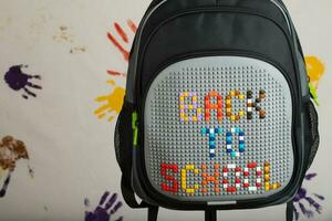 School backpack with BACK TO SCHOOL composition. photo