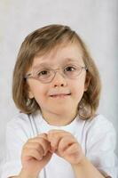 Boy of five years old in eyeglasses. photo
