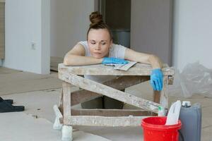 Young lady renovates  apartment photo