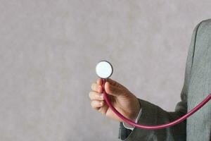 A man with a stethoscope. Closeup photo