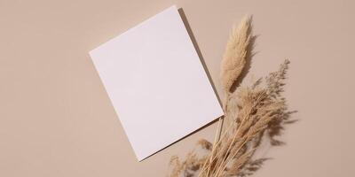 Mockup Paper Wedding Invitation Boho Minimal Style Greeting Card for Wedding Invitations and Birthday Stationery. Top View Flat Lay Copyspace. photo