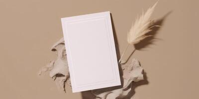 Mockup Paper Wedding Invitation Boho Minimal Style Greeting Card for Wedding Invitations and Birthday Stationery. Top View Flat Lay Copyspace. photo