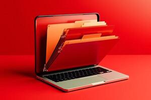 Red laptop screen with file folder, photo