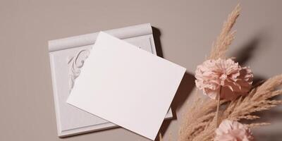 Mockup Paper Wedding Invitation Boho Minimal Style Greeting Card for Wedding Invitations and Birthday Stationery. Top View Flat Lay Copyspace. photo