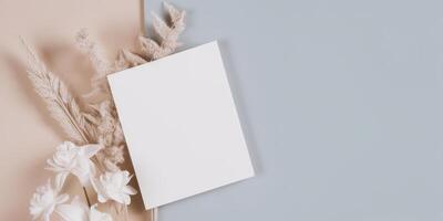 Mockup Paper Wedding Invitation Boho Minimal Style Greeting Card for Wedding Invitations and Birthday Stationery. Top View Flat Lay Copyspace. photo