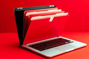 Red laptop screen with file folder, photo