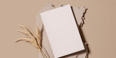 Mockup Paper Wedding Invitation Boho Minimal Style Greeting Card for Wedding Invitations and Birthday Stationery. Top View Flat Lay Copyspace. photo