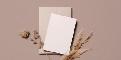 Mockup Paper Wedding Invitation Boho Minimal Style Greeting Card for Wedding Invitations and Birthday Stationery. Top View Flat Lay Copyspace. photo