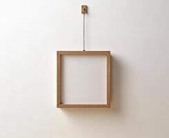 Blank Wooden Picture Frame Mockup Hanging on Wall Empty Poster Mockup for Art Display. Front View with Copy Space photo