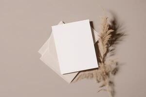 Mockup Paper Wedding Invitation Boho Minimal Style Greeting Card for Wedding Invitations and Birthday Stationery. Top View Flat Lay Copyspace. photo