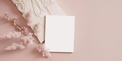 Mockup Paper Wedding Invitation Boho Minimal Style Greeting Card for Wedding Invitations and Birthday Stationery. Top View Flat Lay Copyspace. photo