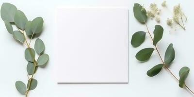 Minimalist Greeting Card Mockup with Delicate Dry Eucalyptus Leaves - Top View on a Clean White Background, AI Generated photo