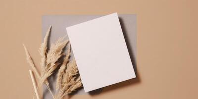 Mockup Paper Wedding Invitation Boho Minimal Style Greeting Card for Wedding Invitations and Birthday Stationery. Top View Flat Lay Copyspace. photo