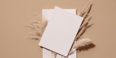 Mockup Paper Wedding Invitation Boho Minimal Style Greeting Card for Wedding Invitations and Birthday Stationery. Top View Flat Lay Copyspace. photo