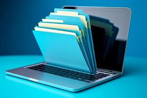 Laptop screen shows blue background with file folder, photo