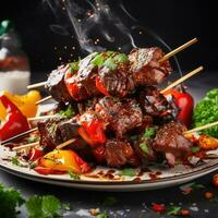 Succulent churrasco, grilled meat on skewers photo