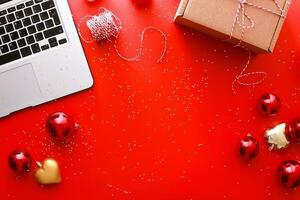 Flatly christmas on red background. Gift wrapping. Online purchase of gifts. Black Friday photo