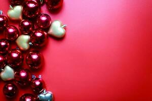 Flatly Christmas toys for the Christmas tree. Christmas decorations on a red background photo