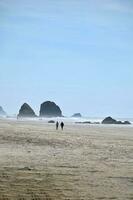 A view of Haystack Rock at Canon Beach Oregon photo