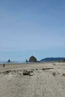 A view of Haystack Rock at Canon Beach Oregon photo