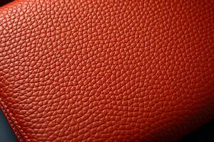 Textured leather contrasting with a sleek, unadorned surface photo