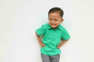 Portrait of a cheerful little Asian boy isolated on the white background photo