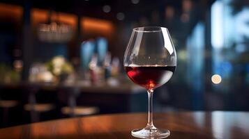 vino en un vaso en un Bebiendo bar con un borroso antecedentes ai generado foto