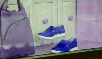 pair of women's blue shoes photo