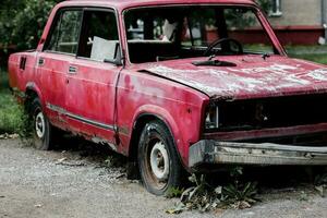 discarded old car. photo