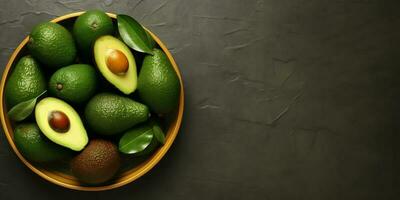 Avocado fruit on bowl copy space dark background, AI generated photo