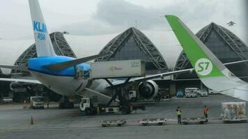 BANGKOK, THAILAND NOVEMBER 11, 2017 - Airplanes on apron of Subvarnabhumi airport, view fom taxiing aircraft video